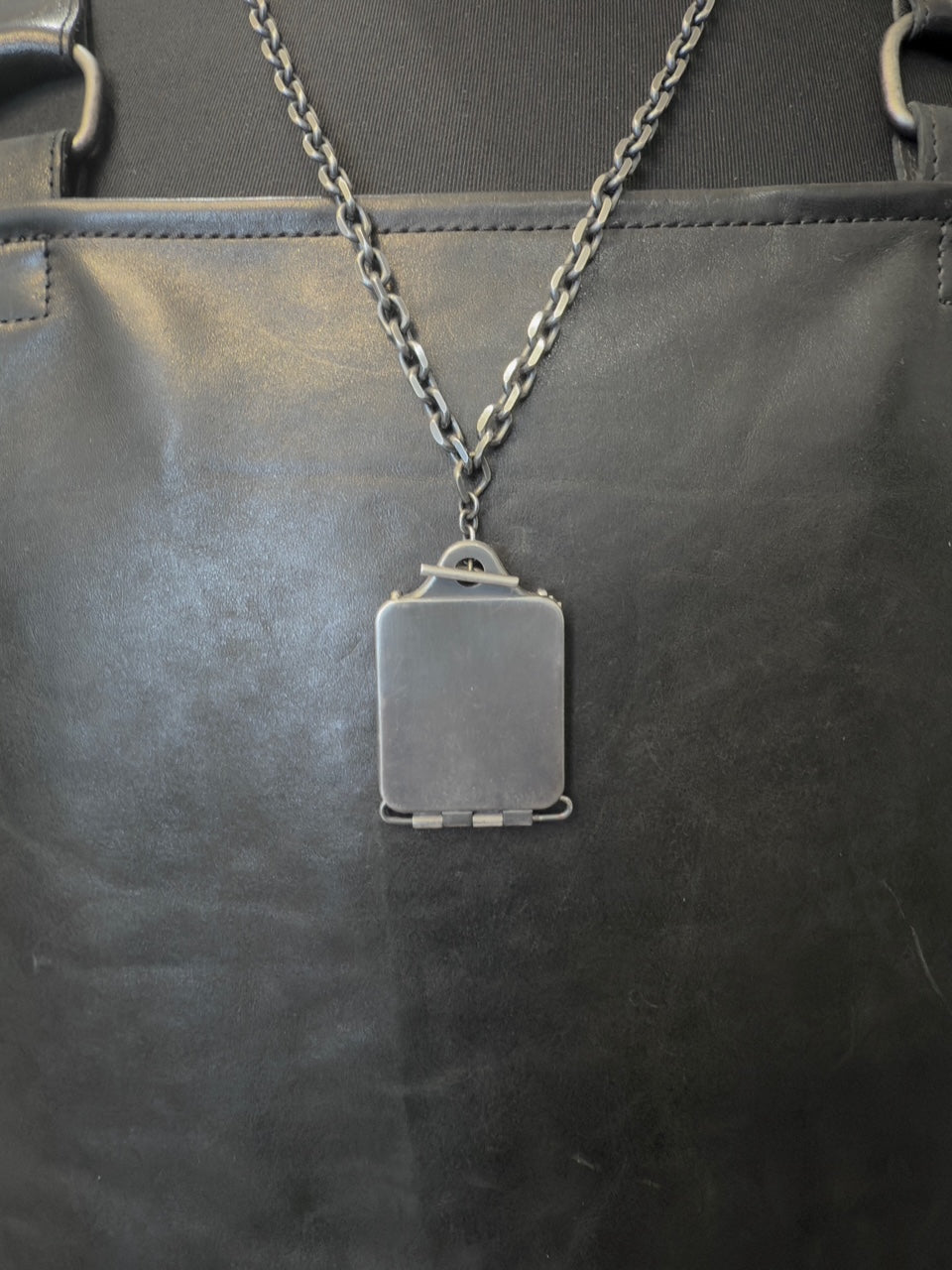 Silver DOC TAG Necklace by DEEPTI BARTH