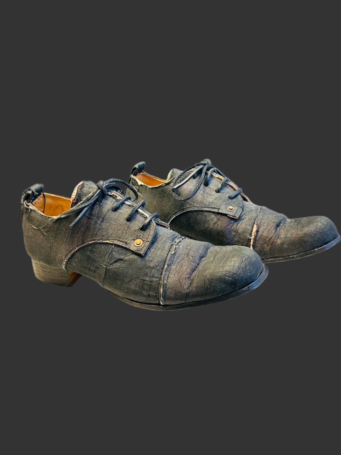 Black Voile over Newspaper Print Derbies by Paul Harnden