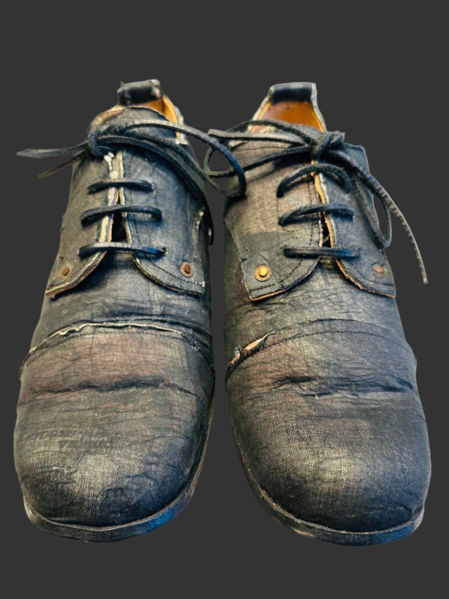 Black Voile over Newspaper Print Derbies by Paul Harnden