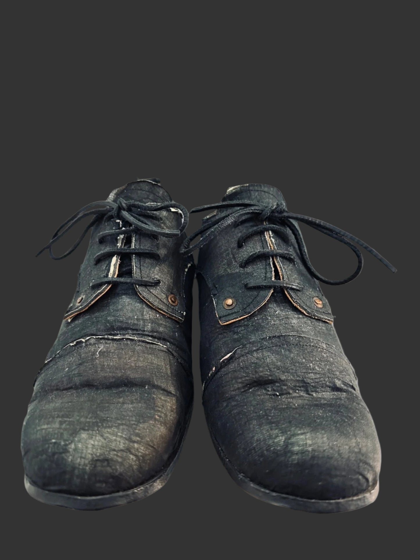 Black Voile over Newspaper Print Derbies by Paul Harnden