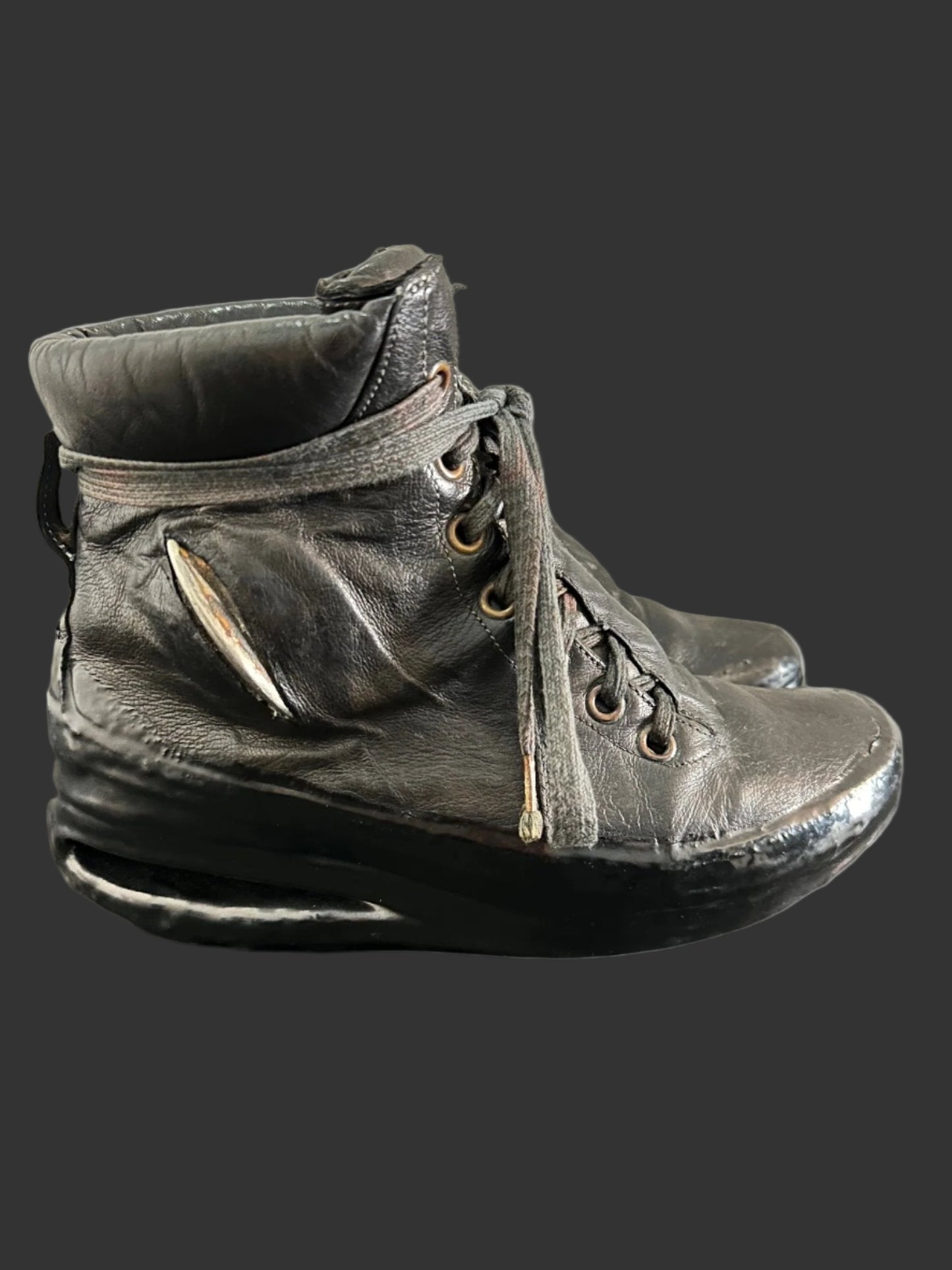 Black One Piece U-Sole Prosthetic Drip Sneakers by Carol Christian Poell
