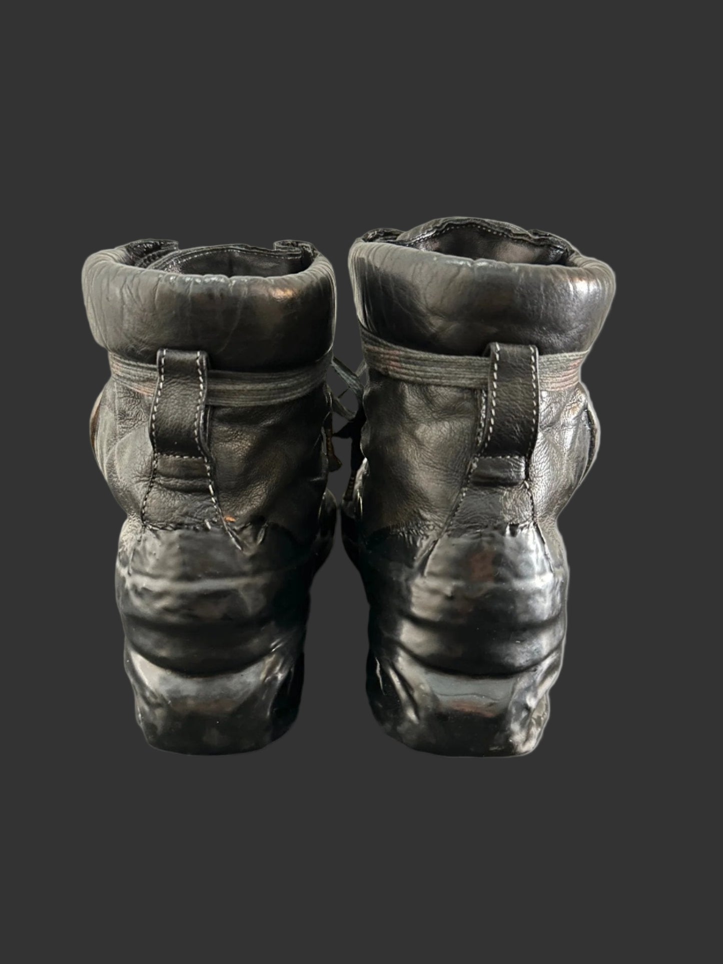 Black One Piece U-Sole Prosthetic Drip Sneakers by Carol Christian Poell