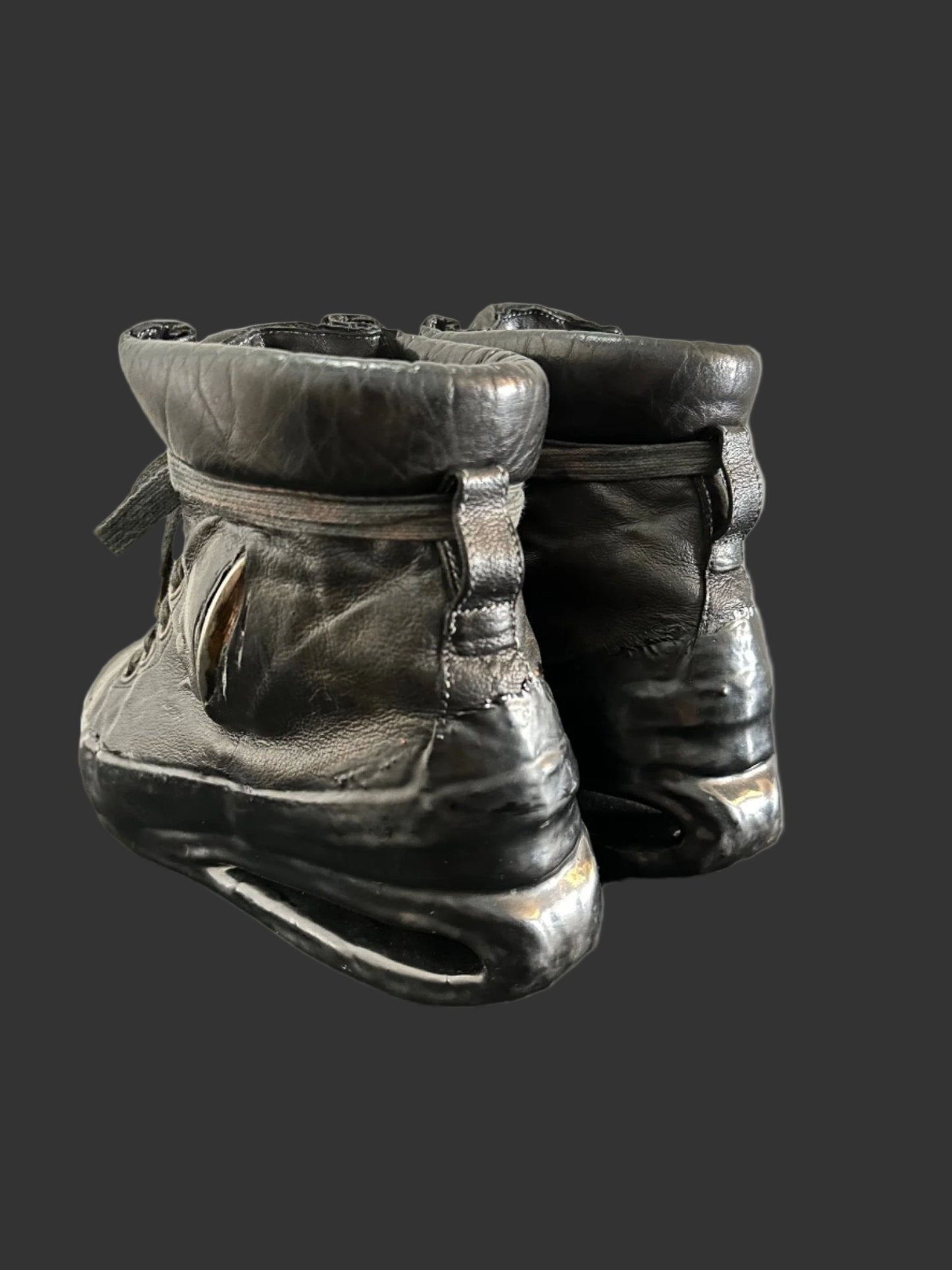 Black One Piece U-Sole Prosthetic Drip Sneakers by Carol Christian Poell