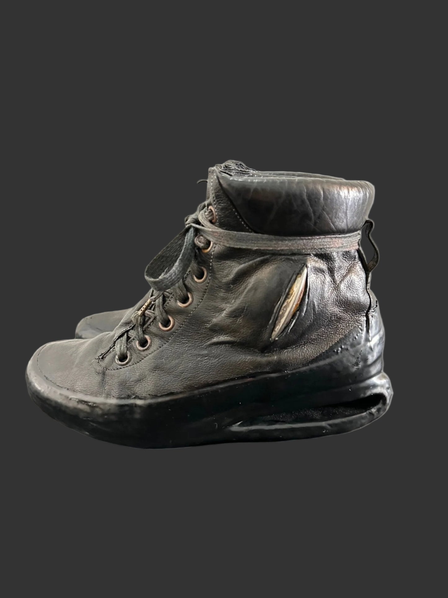 Black One Piece U-Sole Prosthetic Drip Sneakers by Carol Christian Poell