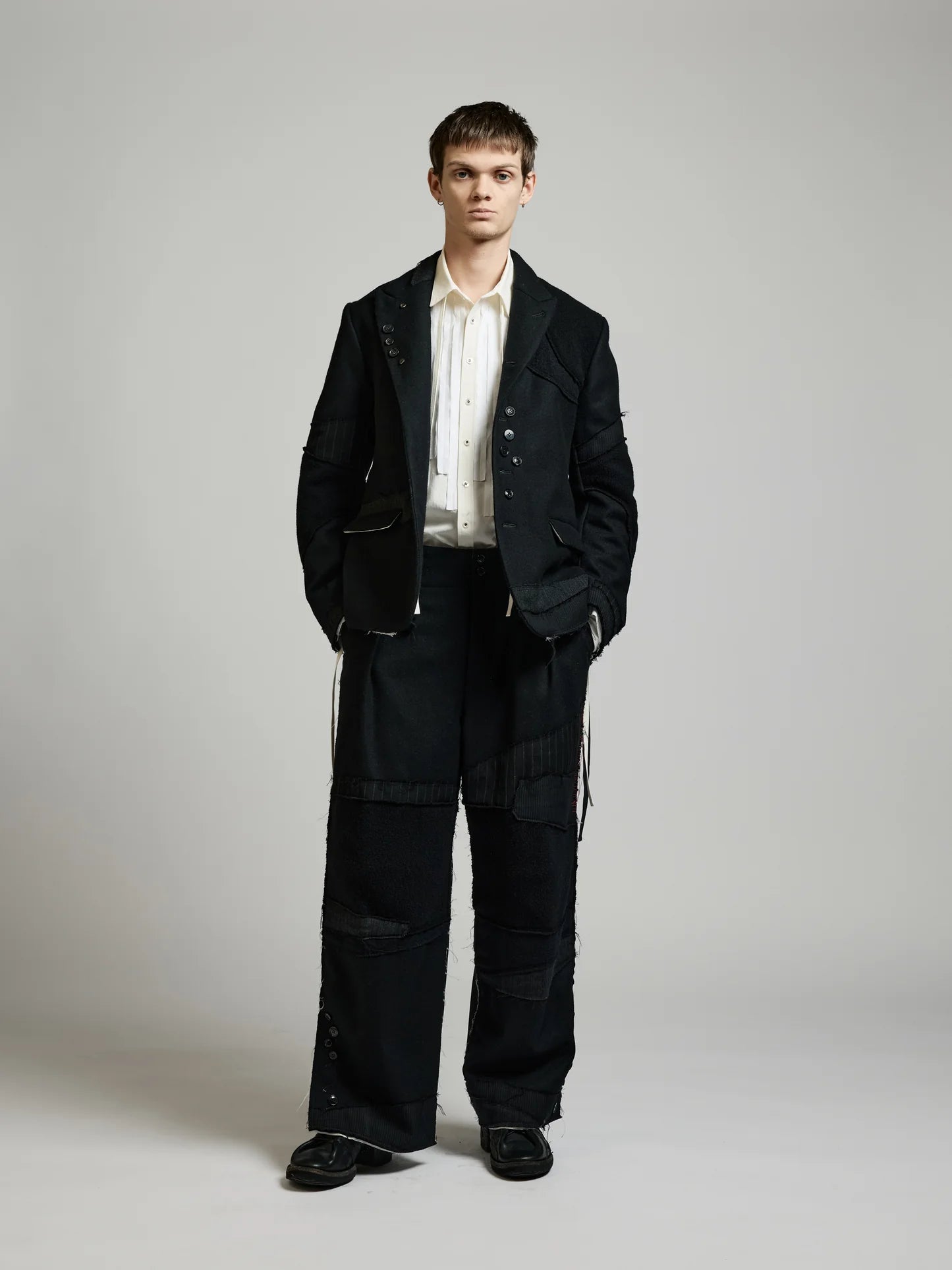 Black Multi Buttons Patch Blazer by DUELLUM