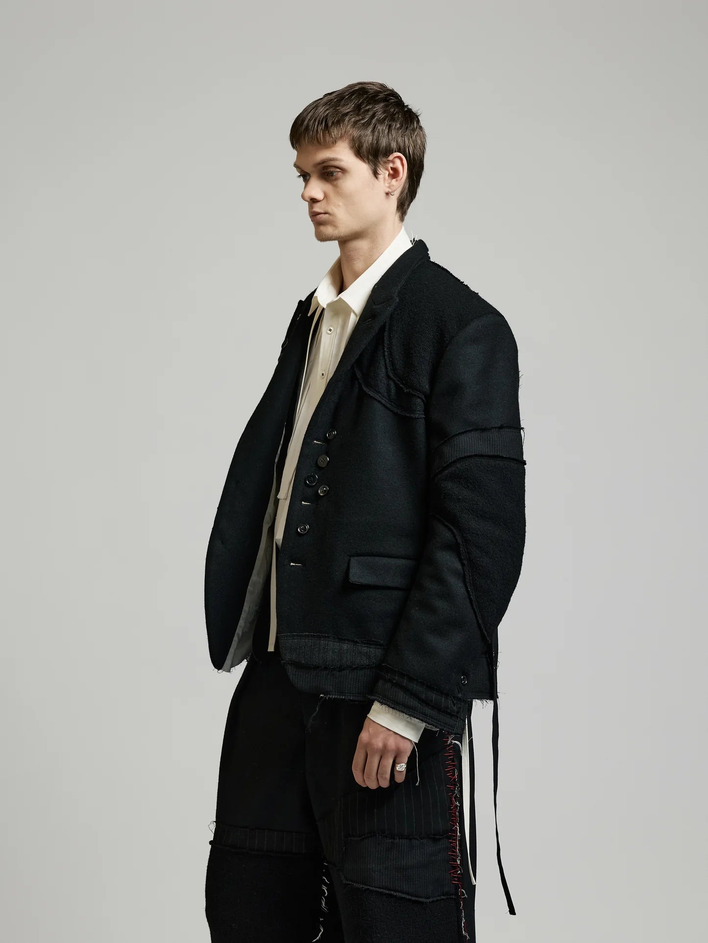 Black Multi Buttons Patch Blazer by DUELLUM