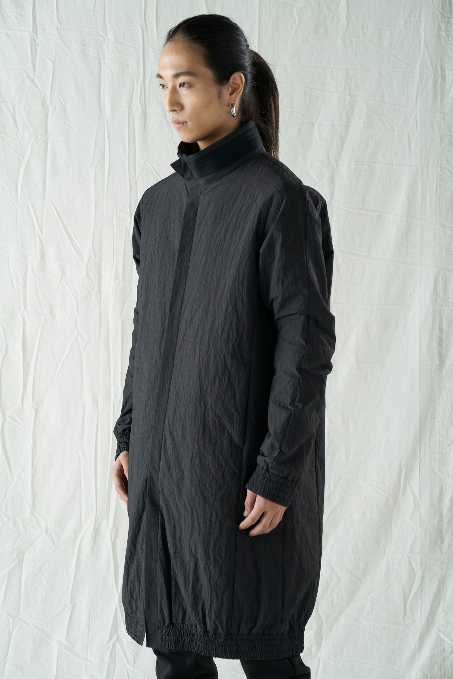 Black Cotton Nylon Hi-Neck Front Zip Quilted Raglan Coat