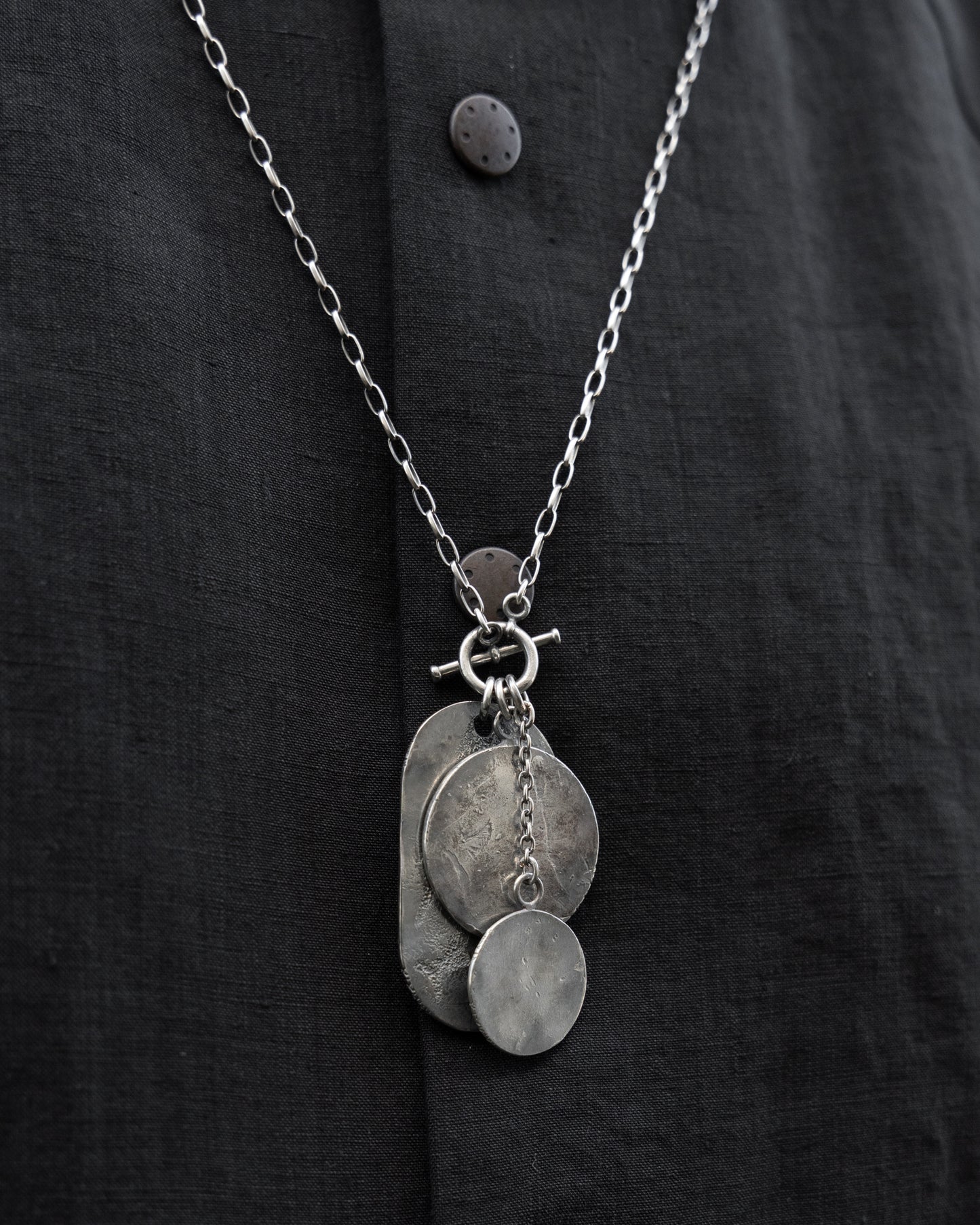Silver Coins and Dog Tag Pendant