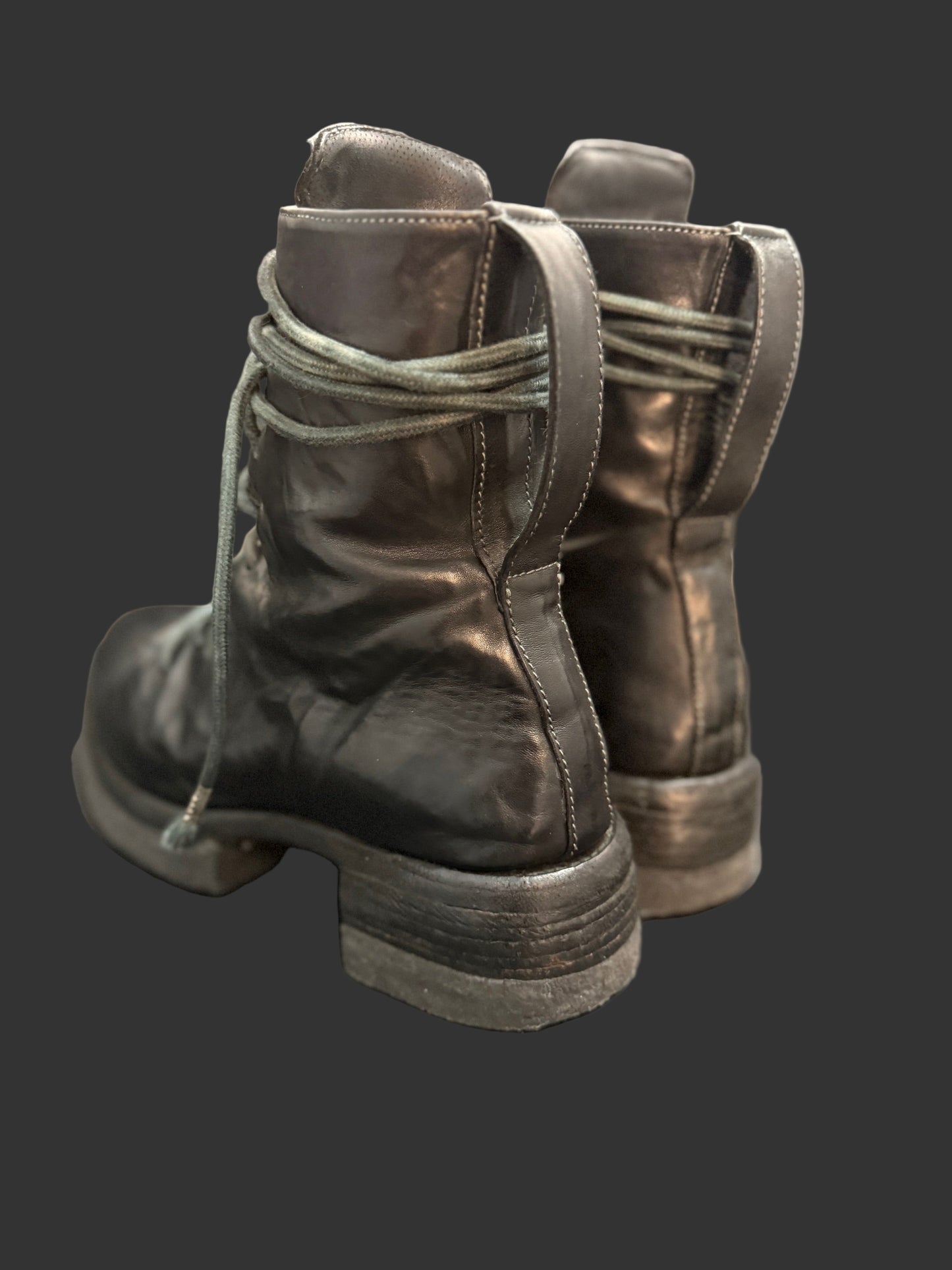 Black Object Dyed Horse Leather Combat Boots by Carol Christian Poell