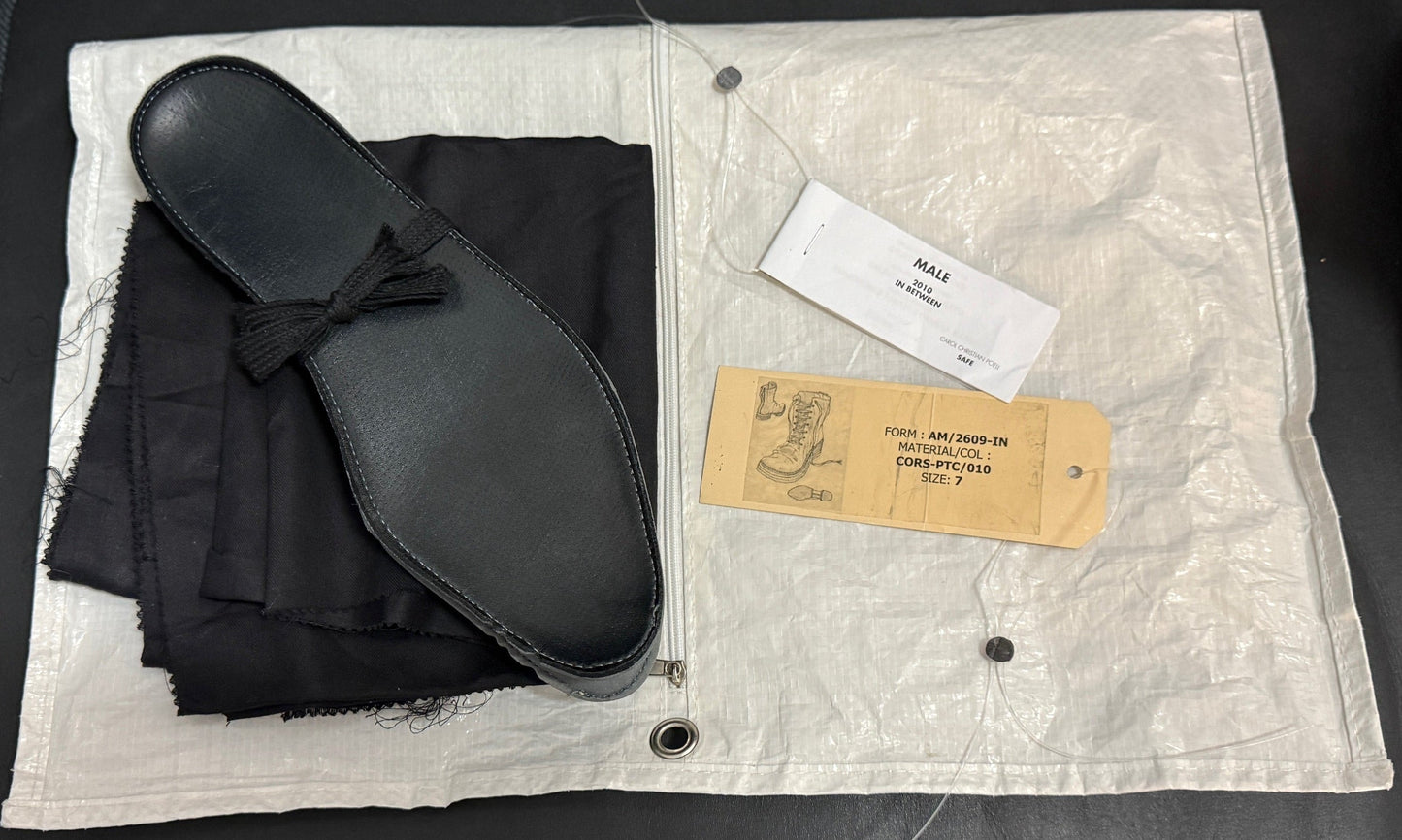 Black Object Dyed Horse Leather Combat Boots by Carol Christian Poell