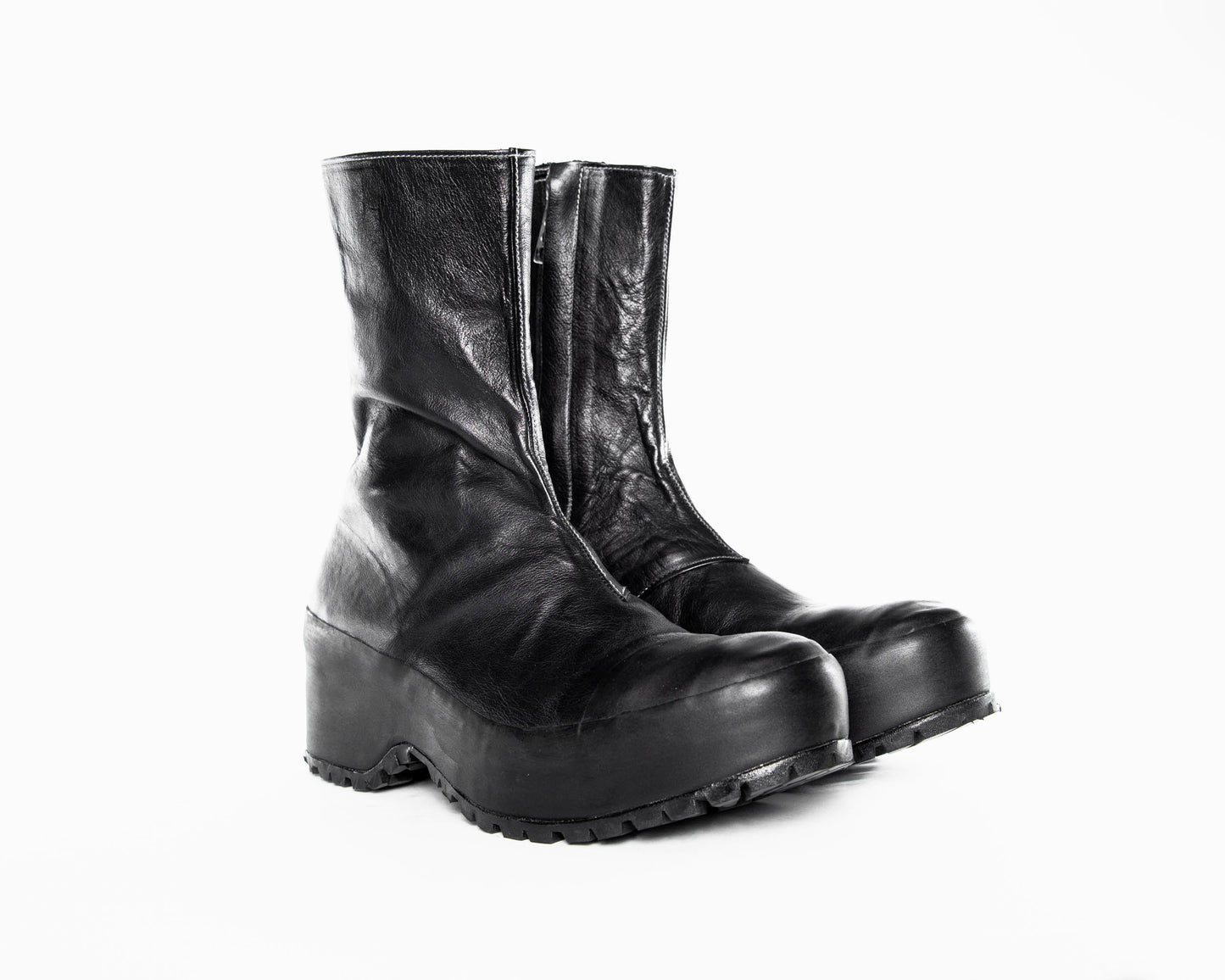 Black Vulcanized Calf Leather Boots by Obscur